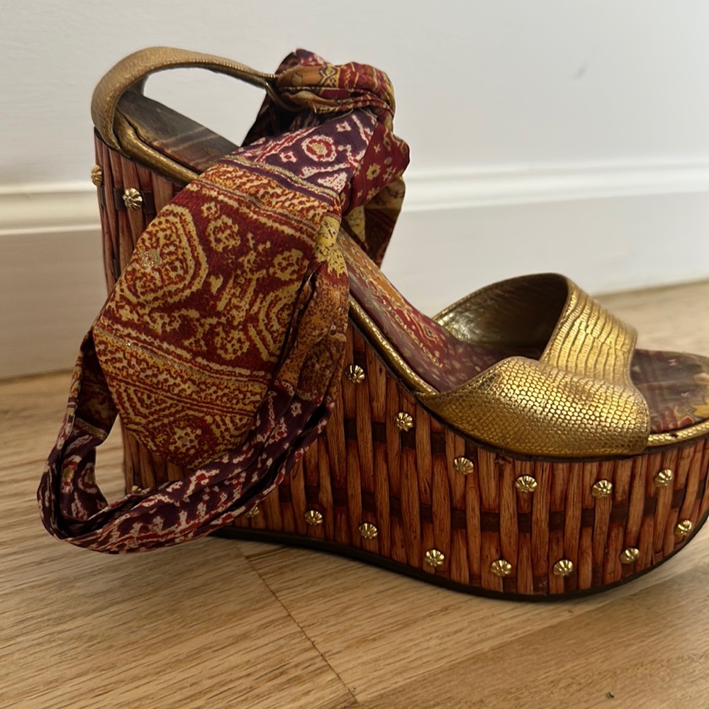 Beautiful Giuseppe Zanotti shoes , in need of some tlc, hence the price